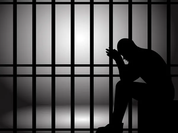 Vector illustration of a man lock up in prison
